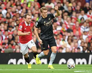 Odegaard Outshines Eriksen: Arsenal's Thrilling Victory Over Manchester United in the Premier League 2022-23