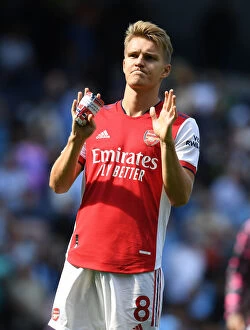 Manchester City v Arsenal 2021-22 Collection: Odegaard Salutes: Arsenal's Standout Moment at Manchester City, Premier League 2021-22