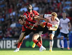 Odegaard Stands Firm: Arsenal's Midfield Battle against Bournemouth's Pearson and Lerma