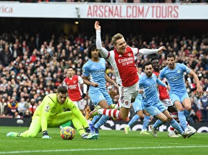 Arsenal v Manchester City 2021-22 Collection: Odegaard vs Ederson: A Clash of Titans at the Emirates - Arsenal vs Manchester City