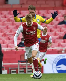 Arsenal V Brighton And Hove Albion 2020-21 Prints: Odegaard vs Mac Allister: A Premier League Battle at Emirates Stadium