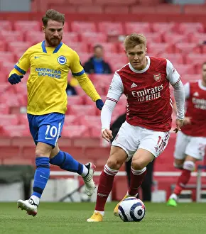 Arsenal V Brighton And Hove Albion 2020-21 Prints: Odegaard vs Mac Allister: A Premier League Showdown at Emirates Stadium (2020-21)