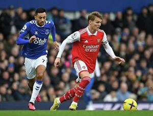 Everton v Arsenal 2022-23 Collection: Odegaard vs. McNeil: A Premier League Battle at Goodison Park