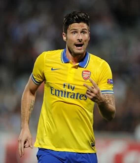 Images Dated 18th September 2013: Olivier Giroud in Action: Arsenal vs. Marseille, UEFA Champions League 2013-14