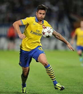 Images Dated 18th September 2013: Olivier Giroud in Action: Arsenal vs. Marseille, UEFA Champions League (2013)