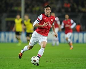 Images Dated 6th November 2013: Olivier Giroud in Action: Arsenal vs. Borussia Dortmund, UEFA Champions League (2013-14)