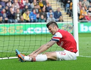 Hull City Collection: Olivier Giroud in Action: Hull City vs Arsenal, Premier League 2013-2014