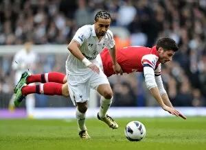 Images Dated 3rd March 2013: Olivier Giroud (Arsenal) Benoit Assou-Ekotto (Tottenham). Tottenham Hotspur 2: 1 Arsenal