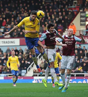 West Ham United V Arsenal 2013-14 Prints: Olivier Giroud (Arsenal) James Collins and James Tomkins (West Ham)