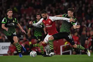 Olivier Giroud (Arsenal) Jordan Houghton and Joe Wright (Doncaster)