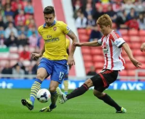 Olivier Giroud (Arsenal) Ki Sung-Yueng (Sunderland). Sunderland 1: 3 Arsenal. Barclays