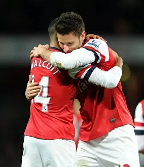Olivier Giroud celebrates scoring his 1st goal for Arsenal with Theo Walcott. Arsenal 7