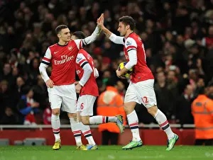 Olivier Giroud celebrates scoring his 2nd goal for Arsenal with Thomas Vermaelen