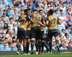 Manchester City V Arsenal 2105-16 Prints: Olivier Giroud celebrates scoring Arsenals 1st goal with his team mates