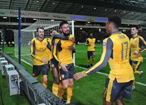 Images Dated 7th January 2017: Olivier Giroud celebrates scoring Arsenals 2nd goal with Aaron Ramsey and Alex Iwobi
