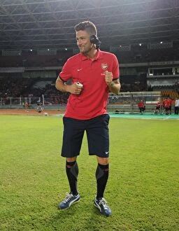 Indonesia Dream Team v Arsenal 2013-14 Collection: Olivier Giroud Dances for Arsenal Fans in Indonesia before Arsenal vs