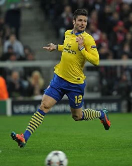 Images Dated 11th March 2014: Olivier Giroud Faces Bayern Munich in the 2013-14 UEFA Champions League