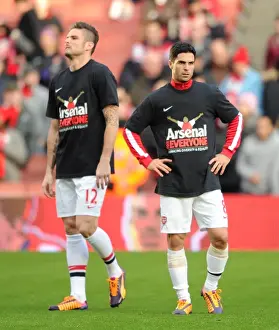 Olivier Giroud and Mikel Arteta (Arsenal) in their Arsenal for Everyone Tshirts. Arsenal 2