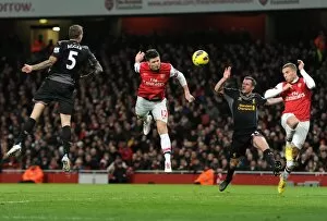 Images Dated 30th January 2013: Olivier Giroud scores Arsenal 1st goal as he gets between Daniel Agger and Jamie Carragher