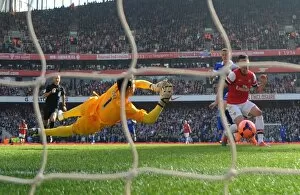 Arsenal v Everton - FA Cup 2014 Collection: Olivier Giroud scores Arsenals 4th goal, his 2nd, past Joel Robles of Everton. Arsenal 4: 1 Everton