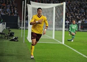 Schalke 04 v Arsenal 2012-13 Collection: Olivier Giroud Scores Arsenal's Second Goal vs. Schalke 04 in 2012-13 UEFA Champions League