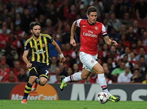 Arsenal V Fenerbahce 2013-14 Prints: Olivier Giroud vs. Gokhan Gonul: Arsenal's Edge in Champions League Showdown (Arsenal v Fenerbahce 2013-14)