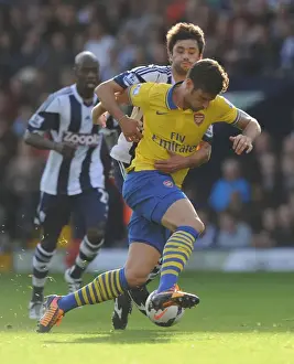 West Bromwich Albion V Arsenal 2013-14 Prints: Olivier Giroud vs Claudio Yacob: A Battle in the Premier League - West Bromwich Albion vs Arsenal (2013-14)
