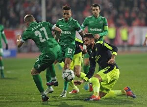 Images Dated 1st November 2016: Olivier Giroud vs Cosmin Moti: A Battle in the UEFA Champions League between Arsenal and Ludogorets