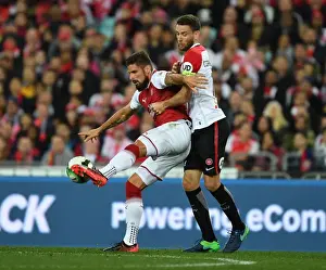 Sydney Western Wanderers V Arsenal 2017-18 Prints: Olivier Giroud vs. Robert Comthwaite: Clash of the Titans in Sydney Football