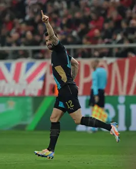 Olympiacos V Arsenal 2015-16 Prints: Olivier Giroud's Champion Goal: Arsenal Triumphs Over Olympiacos in UEFA Champions League (December 2015)