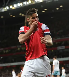 Olivier Giroud's Double: Thrilling Arsenal Victory over West Ham United in the Premier League (April 2014)
