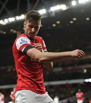 Olivier Giroud's Double: Thrilling Arsenal Victory Over West Ham United in the Premier League (April 2014)