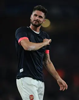 Arsenal V Bayern Munich 2015/16 Prints: Olivier Giroud's Euphoric Moment: Arsenal's Stunner Against Bayern Munich in the Champions League