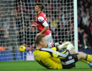 Southampton F C Prints: Olivier Giroud's Goal Celebration: Arsenal vs. Southampton, Premier League 2013-14