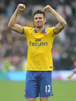 Fulham F C Prints: Olivier Giroud's Goal Celebration: Arsenal's Victory at Fulham (2013-14 Premier League)