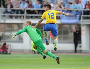 Arsenal V Manchester City Pre Season 2013-14 Prints: Olivier Giroud's Stunning Chip Over Joe Hart: Arsenal's Pre-Season Triumph over Manchester City (2013)