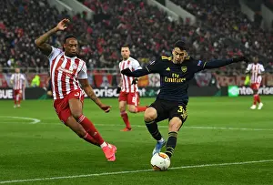 Olympiacos V Arsenal 2019-20 Prints: Olympiacos vs Arsenal: Martinelli Faces Off Against Semedo in Europa League Clash