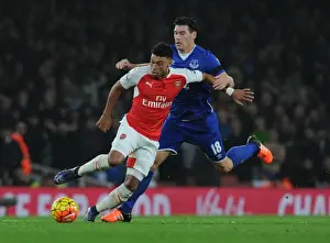 Arsenal V Everton 2015/16 Prints: Oxlade-Chamberlain vs. Barry: A Premier League Battle at Emirates Stadium