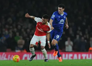 Arsenal V Everton 2015/16 Prints: Oxlade-Chamberlain vs. Barry: A Premier League Showdown at Emirates Stadium