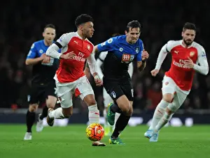 Arsenal V Bournemouth 2015-16 Prints: Oxlade-Chamberlain vs Daniels: A Battle at Emirates (2015-16)