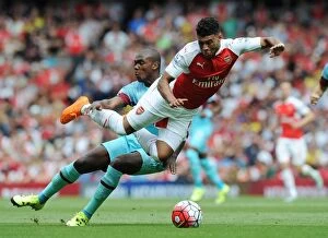 Images Dated 9th August 2015: Oxlade-Chamberlain vs. Ogbonna: Intense Clash Between Arsenal's Winger