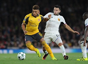 Arsenal V FC Basel 2016-17 Prints: Oxlade-Chamberlain vs. Steffen: A Battle in the Arsenal vs