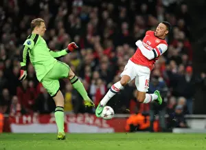 Arsenal V Bayern Munich 2013-14 Prints: Oxlade-Chamberlain's Determined Chase: Closing In on Neuer in Arsenal's Champions League Battle