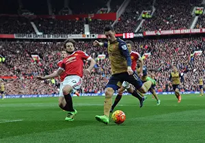 Manchester United V Arsenal 2015/16 Prints: Ozil vs Blind: Battle at Old Trafford - Arsenal's Midfield Clash with Manchester United