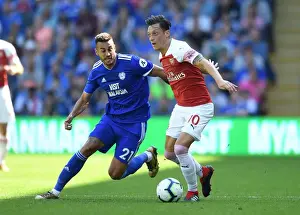 Cardiff City V Arsenal 2018-19 Prints: Ozil vs. Camarasa: Clash of the Midfield Maestros - Cardiff City vs