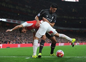 Arsenal V Liverpool 2015/16 Prints: Ozil vs. Can: A Battle of Midfield Maestros in Arsenal vs