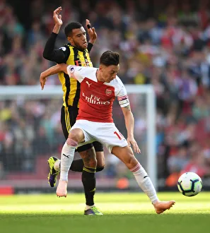 Ozil vs. Capoue: A Premier League Battle at the Emirates