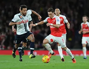 Arsenal V Tottenham Hotspur 2015-16 Prints: Ozil vs. Dembele: A Battle of Midfield Maestros in the Arsenal vs