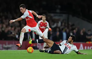 Arsenal V Tottenham Hotspur 2015-16 Prints: Ozil vs. Dembele: Intense Rivalry Unfolds - Arsenal vs