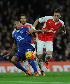 Arsenal V Everton 2015/16 Prints: Ozil vs. Galloway: A Premier League Showdown at Emirates Stadium